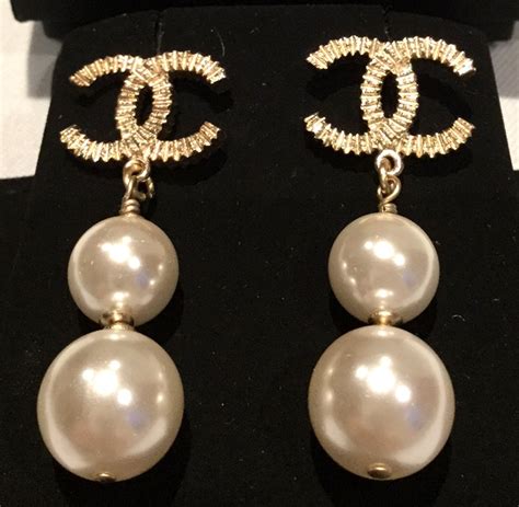 chanel big pearl earrings|authentic Chanel earrings.